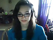 juggy nerdy brunette in glasses having fun on webcam