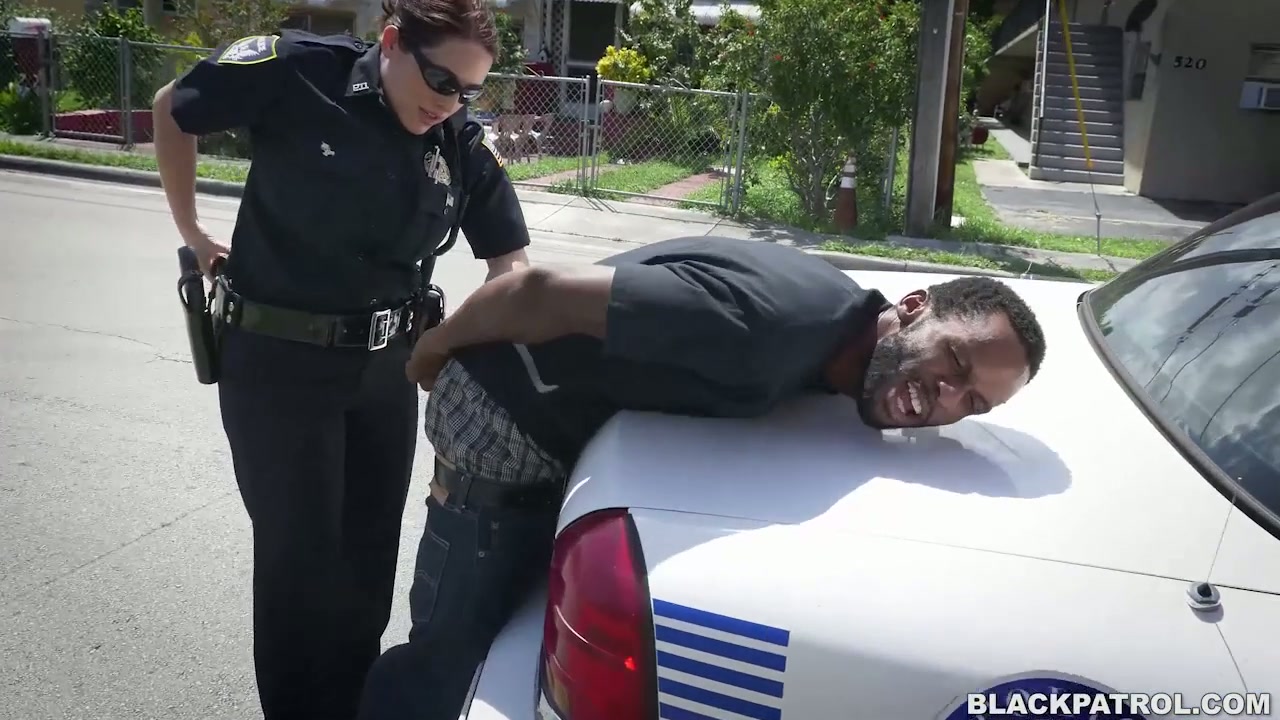 Two sex-hungry police chicks fuck arrested black dudes right in the street