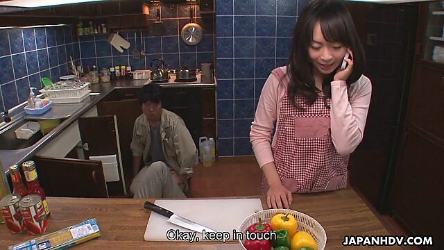 Kinky Asian housewife Nozomi Hazuki gives a blowjob to one kinky plumber