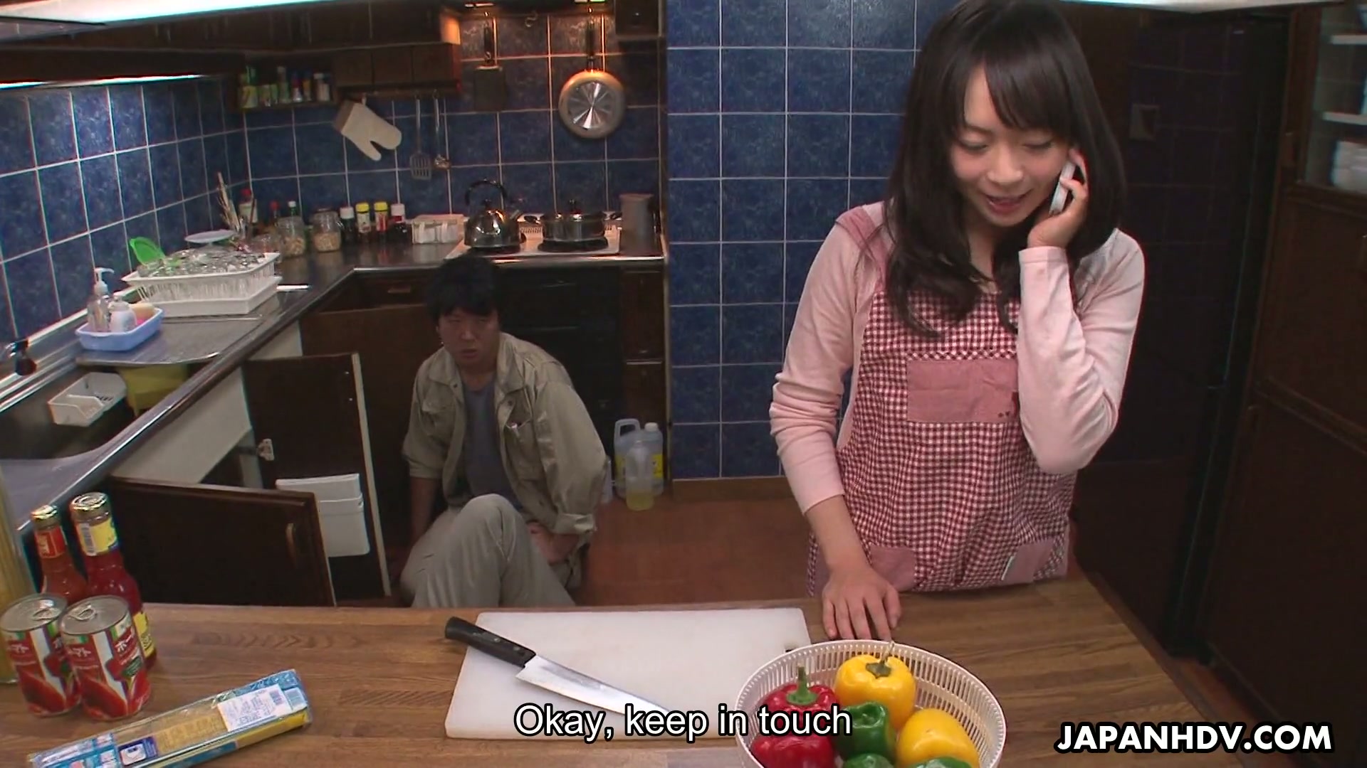 Kinky Asian housewife Nozomi Hazuki gives a blowjob to one kinky plumber picture