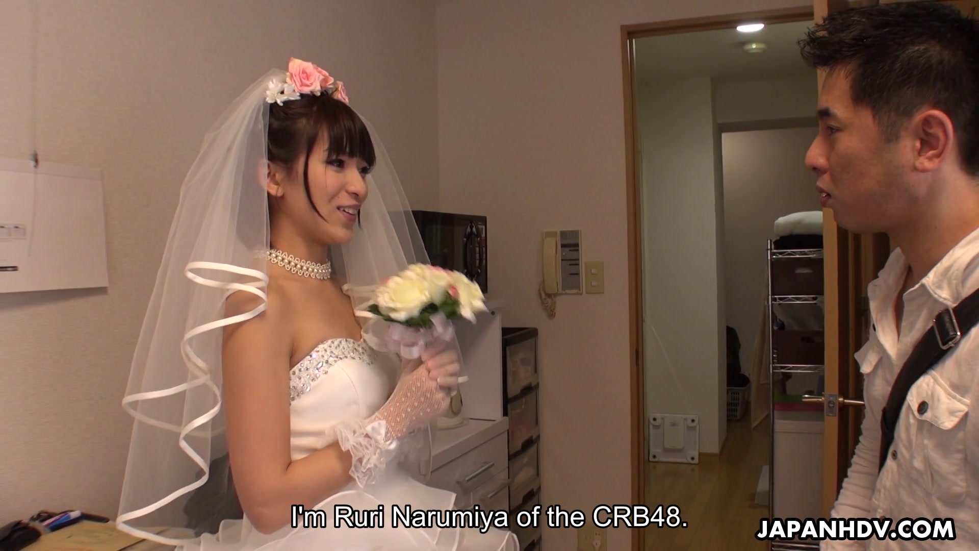Japanese bride gives a blowjob to one of lucky clients picture
