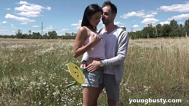 Young busty girlfriend Foxxi Black gets laid in the field